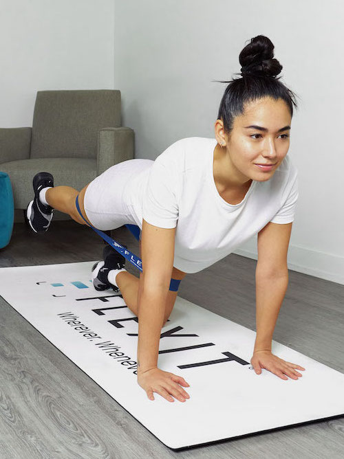 Woman working out with resistance band